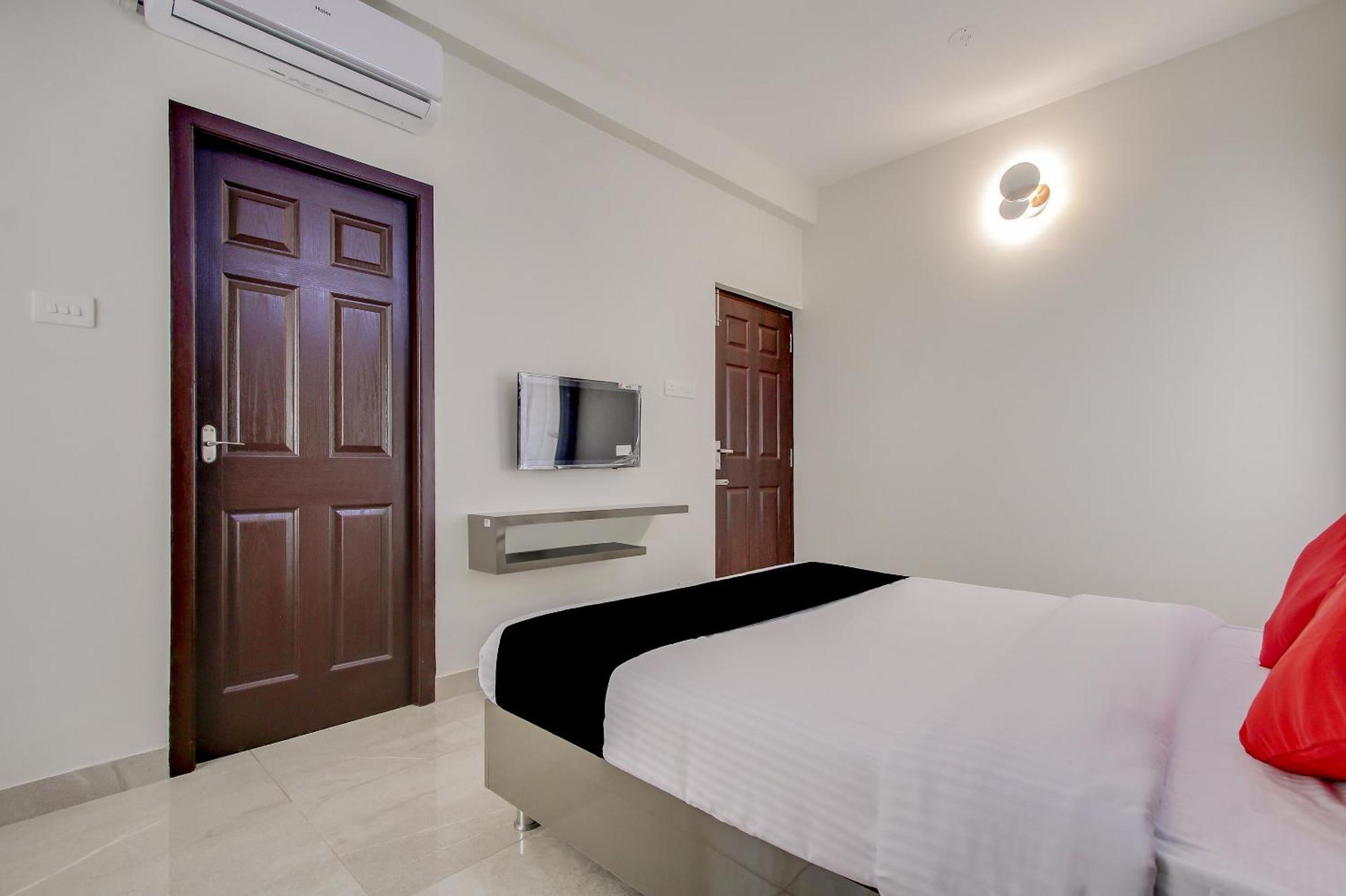Capital O New Paradise Inn Irugur Exterior photo